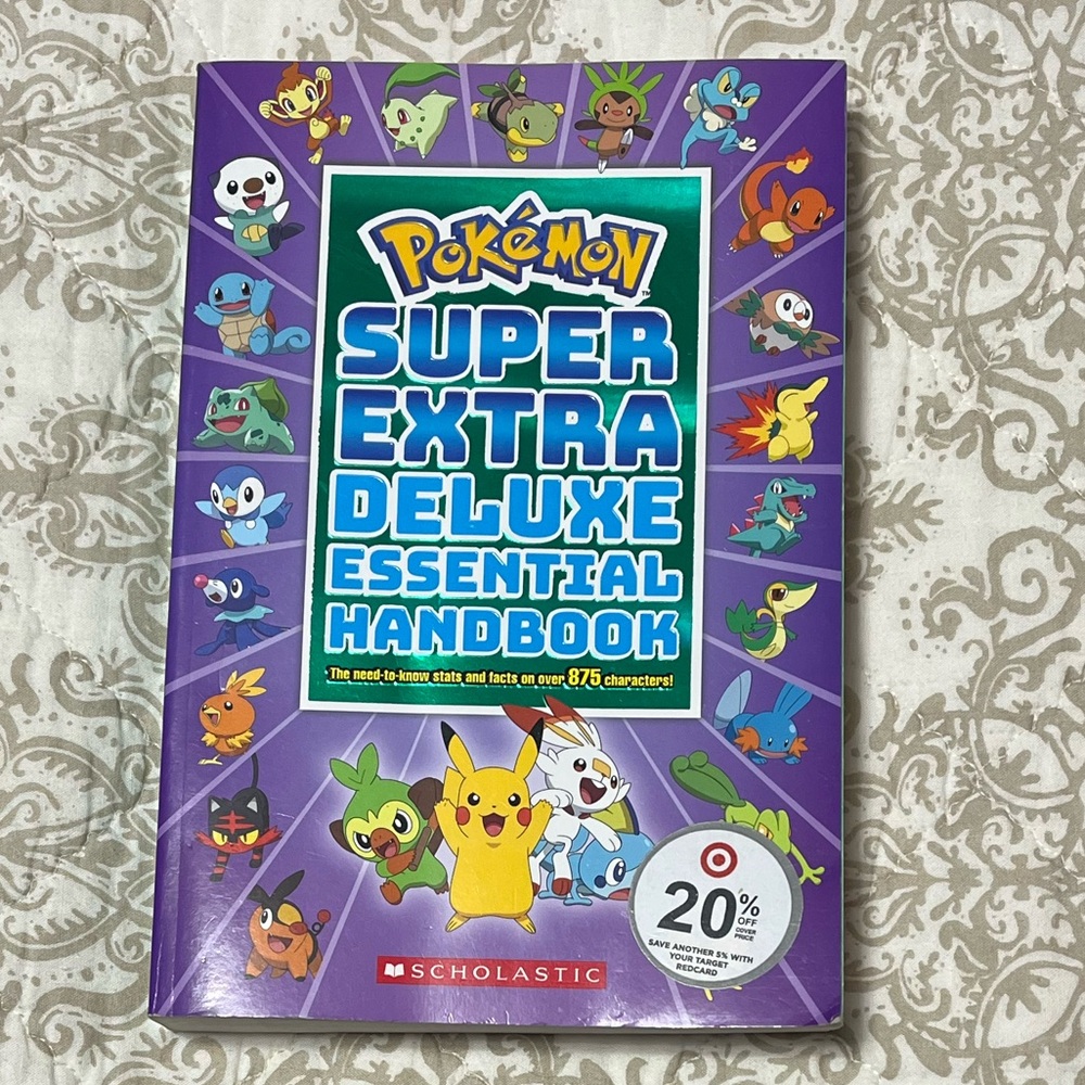 Scholastic Pokemon Deluxe Handbook with Blue and Yellow Accents
